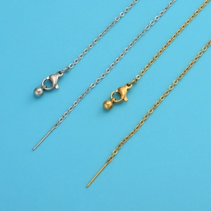 Detail showing gold and silver stainless steel beaded chains on blue background