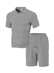 Close-up of gray short-sleeve polo shirt and drawstring shorts with ribbed texture