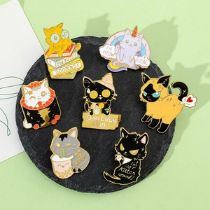 Set of seven cartoon cat enamel pins with fun quotes on a round black display stone