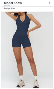 Detail of navy blue brushed yoga set with halter back top and high waist sports shorts