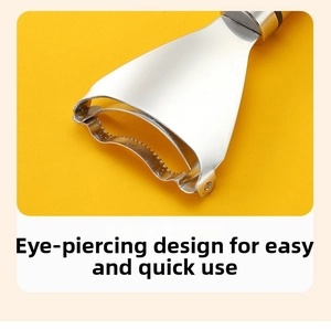 Detail of stainless steel corn peeler featuring a specialized bud eye remover design