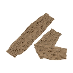Detailed view of brown knit leg warmers with leaf pattern and ribbed cuffs on white back