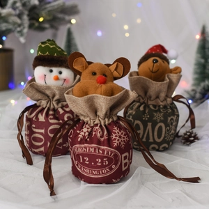 Christmas themed velvet drawstring gift bags with doll decorations for holiday treats