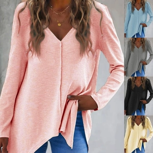 Detail view of v-neck knit sweater showing irregular hem in pink, blue, gray and yellow