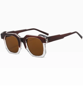 Detail of trendy irregular square sunglasses with brown and transparent mixed frames