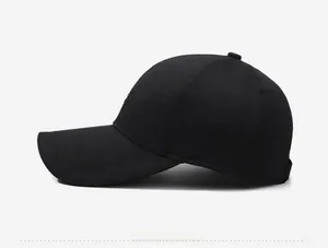 Side view of black baseball cap with sports embroidery and adjustable strap detail