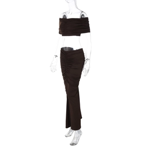 Detail of chocolate brown ruched crop top and high waist long skirt set for women