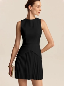 Elegant sleeveless black pleated dress with a tailored waist and flared skirt for women