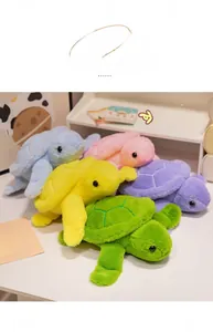 Macro shot of colorful plush turtle toys in pastel blue, pink, and green soft fabric