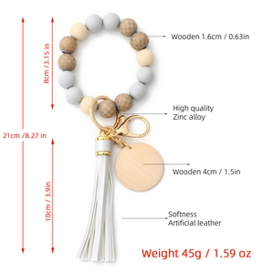 Detailed view of checkerboard bead keychain with dimensions and faux leather tassel