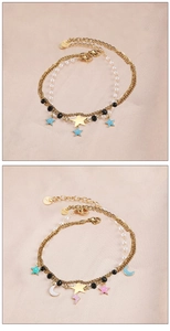 Detailed view of layered stainless steel bracelets with white pearls and colorful enamel charms