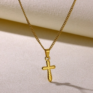 Elegant 18K gold-plated stainless steel cross pendant necklace on a refined metal chain
