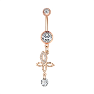 Macro detail of rose gold belly ring with zircon inlays and hollow leaf pendant