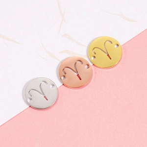 Three mirror-polished zodiac connector charms in silver, gold, and rose gold finishes