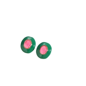Vintage oval enamel earrings in retro green and pink color blocks on white background