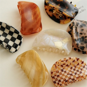 French style acetate hair claw clips in tortoise and checker patterns for thick hair