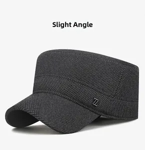 Side view detail of dark grey flat top winter hat with woven texture and metal Z logo