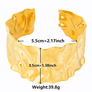 Detail of 18k gold plated stainless steel cuff showing 5.5cm diameter and 3.5cm width