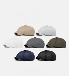 Detail showing seven different colors of breathable mesh berets with soft top design