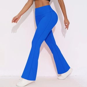 Detail of high waisted flare leggings in royal blue showing the lift and fit of the fabric