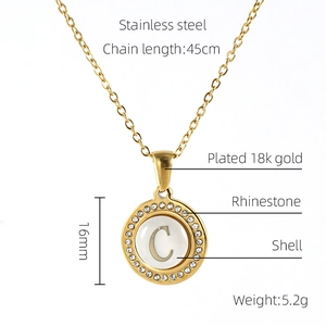 Detail view of 18k gold plated stainless steel necklace with shell letter C pendant