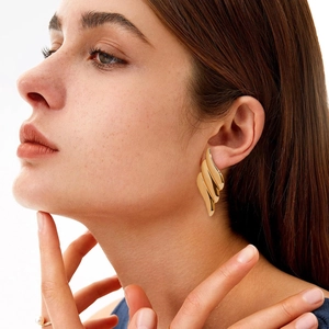 Chic 18K gold plated stainless steel wave earrings with hammered irregular texture