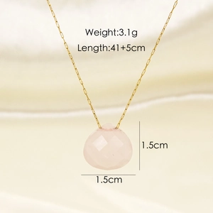 Detail view of pink teardrop crystal pendant measuring 1.5cm by 1.5cm on a thin gold chain