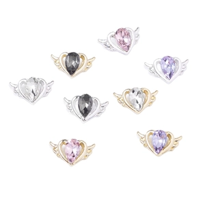 Assorted heart-shaped winged nail art charms with colorful gems in gold and silver plating