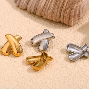 Minimalist geometric X-shaped stainless steel earrings in gold and silver finishes