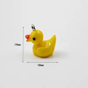 Detailed view of yellow acrylic duck pendant with dimensions of 19mm height and 18mm width