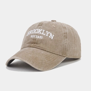 Detail of vintage washed baseball cap with white Brooklyn EST 1631 embroidery