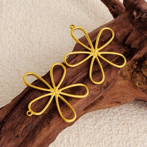 304 stainless steel hollow flower pendants in gold finish for DIY jewelry making