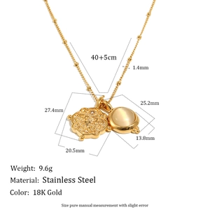 Collier en acier inoxydable plaqué or 18 carats avec pendentifs disque et œil-de-chat