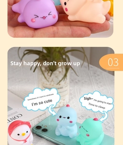 Miniature colorful dinosaur squeeze toys for stress relief and fun water play time