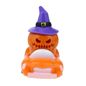 Close-up of Halloween pumpkin pull back car toy with purple witch hat on white background