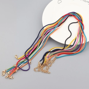 Colorful snake and box chain necklaces with golden lobster clasps and extension chains
