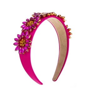 Baroque retro headband featuring magenta fabric and sparkling crystal sunflower designs