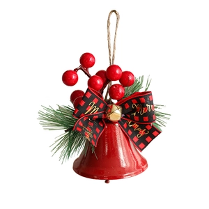 Christmas bell pendant with red bow, pine needles and Merry Christmas ribbon on white background