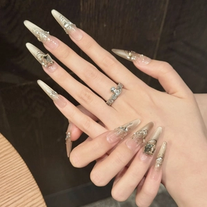 Caramel cat-eye butterfly stiletto press-on nails with silver glitter and pearl accents