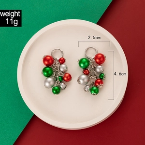Detail view of colorful pearl Christmas earrings with dimensions of 2.5cm by 4.6cm