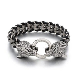 Men's retro braided leather bracelet featuring dual wolf heads and a steel ring clasp