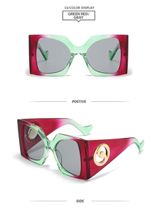 Front and side views of square gradient red and green frame sunglasses with grey lenses