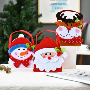 Detailed felt Christmas bags featuring Santa, snowman, and reindeer 3D character designs