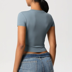Rear view of grey-blue slim fit athletic yoga t-shirt in breathable elastic fabric