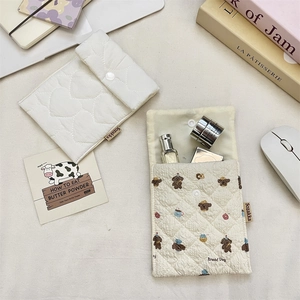 Quilted fabric pouch set with cute dog print and heart texture for small item storage