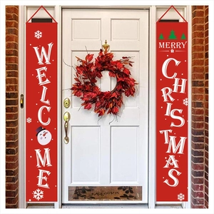 Red Christmas porch banners with Welcome and Merry Christmas text hung on a front door