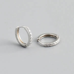 Detailed close-up of S925 sterling silver hoop earrings with pavé set zircon stones
