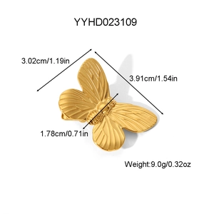 Elegant gold butterfly hair clip in stainless steel with realistic wing textures