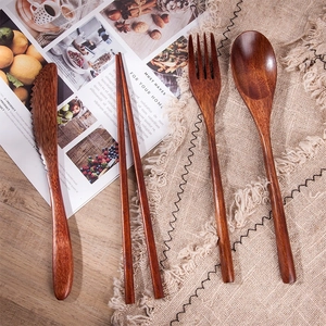 Japanese style 4-piece dark wood cutlery set with knife, fork, spoon and chopsticks