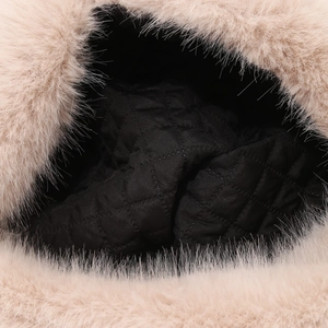 Fluffy pink faux fox fur trapper hat with quilted black windproof lining for winter warmth
